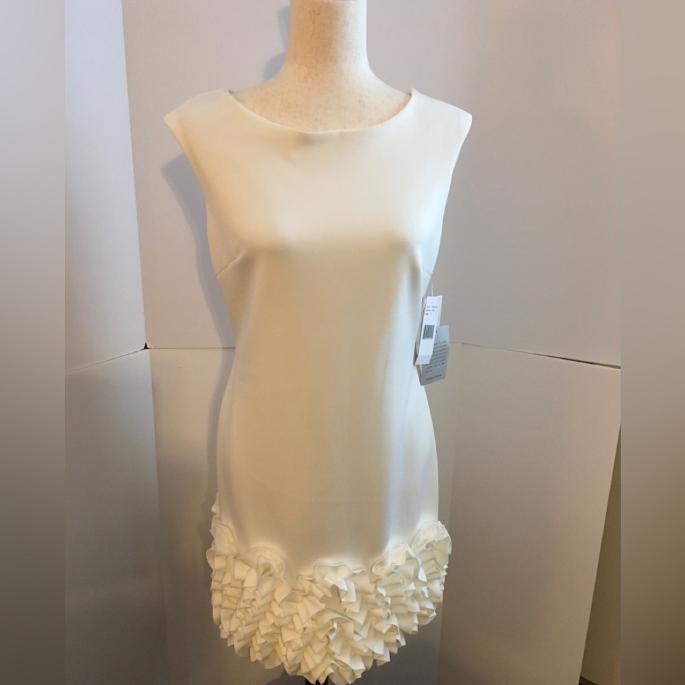 Donna Rico Sleeveless Cream/White Ruffle-Hem Dress